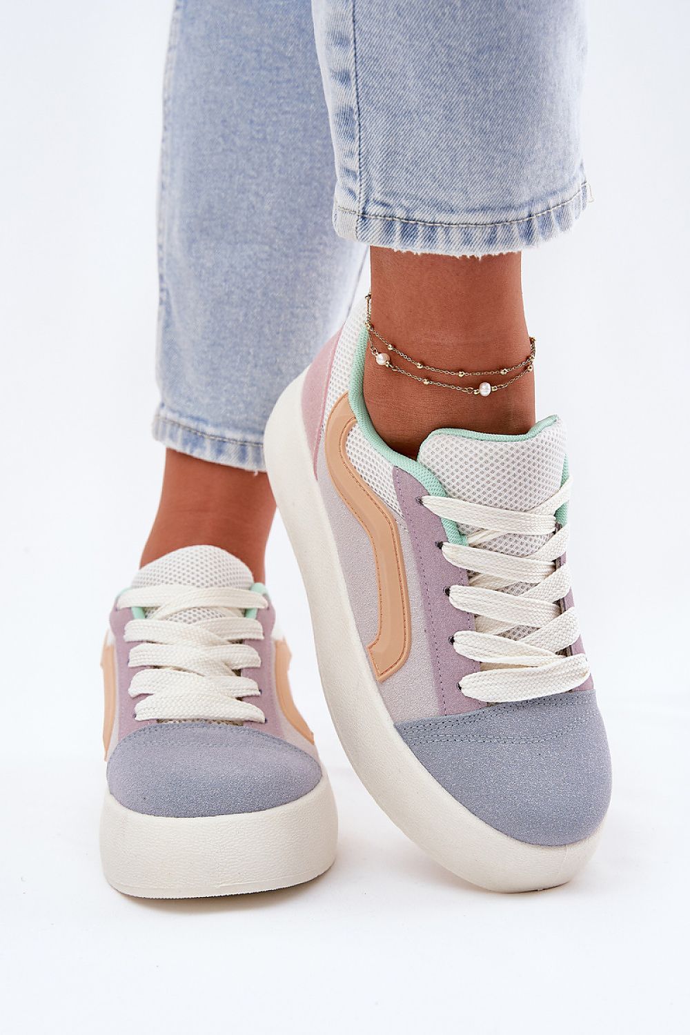 Sleek side view of Step in Style women's suede platform sneakers, featuring a chic rounded toe and soft insole for ultimate comfort.