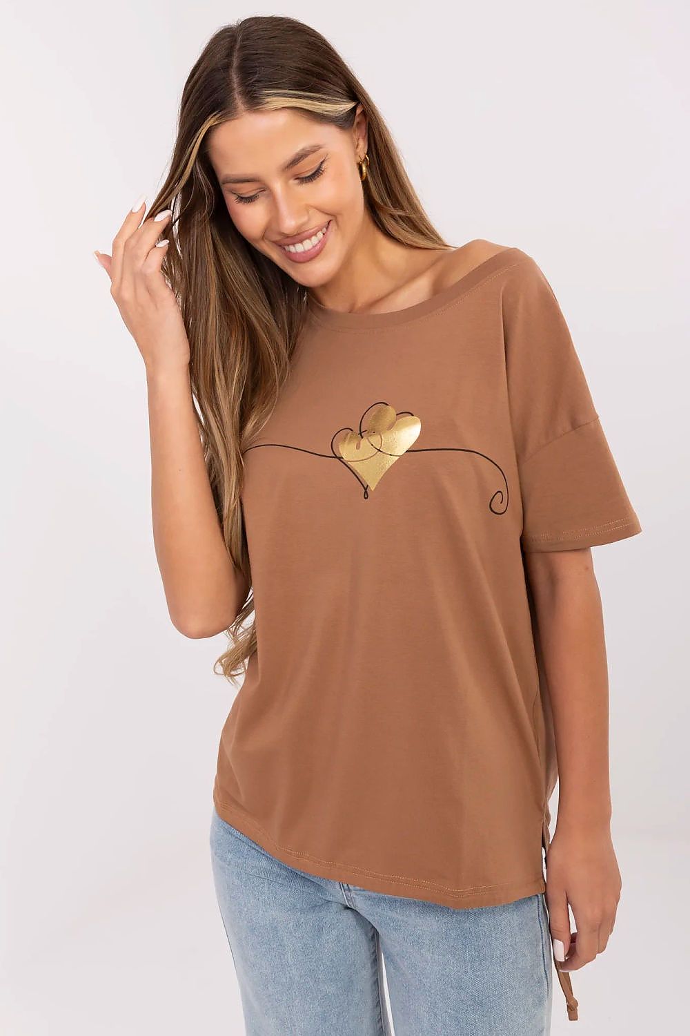 Stylish women's casual t-shirt showcasing a unique print and feminine side tie designed by Factory Price, perfect for shopping or social outings.