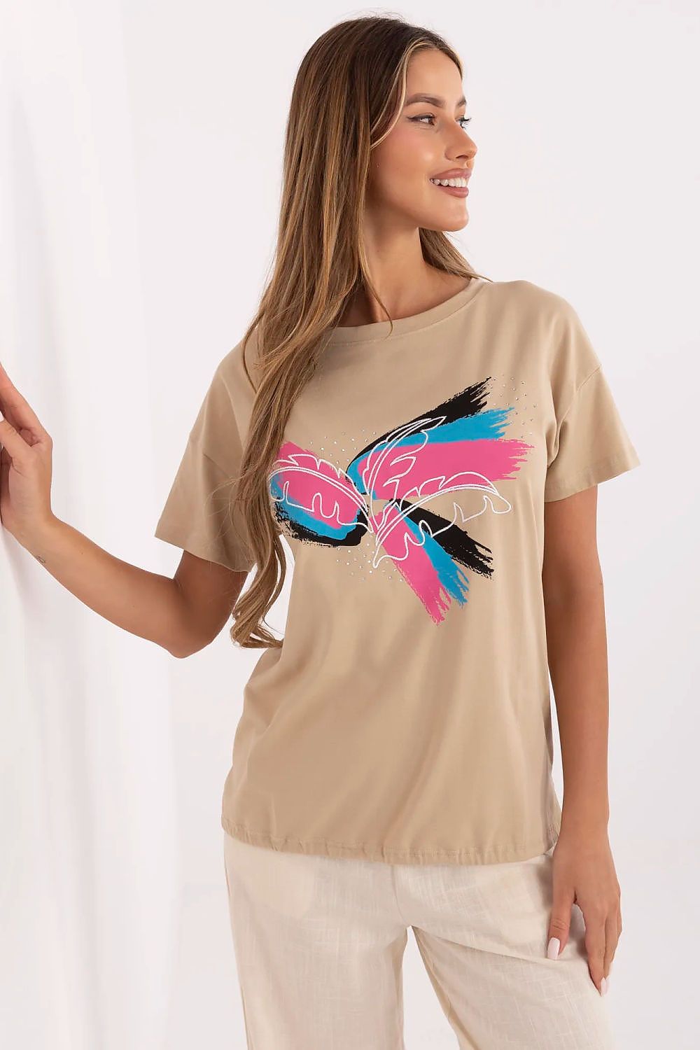 Close-up of elegant women's t-shirt by Factory Price showcasing sparkling beads and embroidery, perfect for stylish everyday wear.