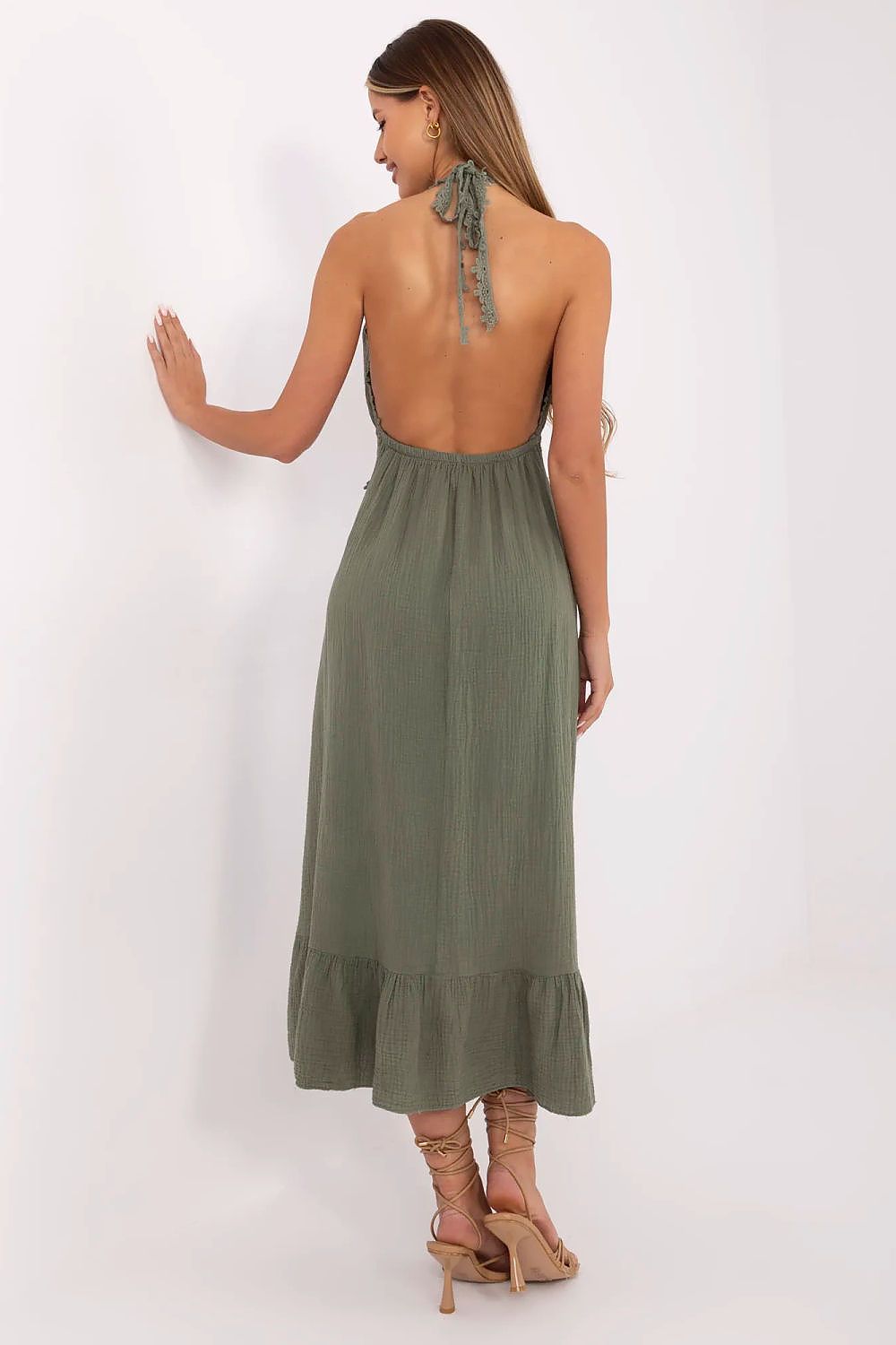 Side view of the Italy Moda Boho Midi Dress, featuring tied straps and airy ruffles, bringing a touch of charm to any summer wardrobe.