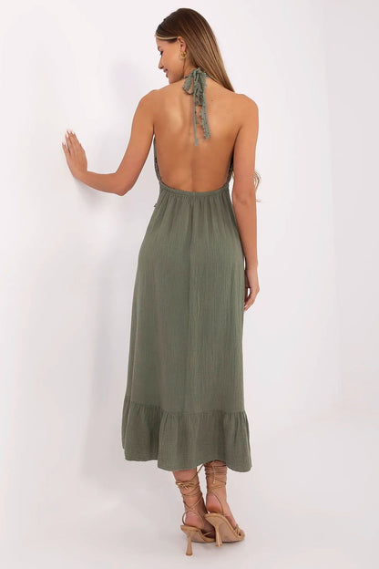 Side view of the Italy Moda Boho Midi Dress, featuring tied straps and airy ruffles, bringing a touch of charm to any summer wardrobe.