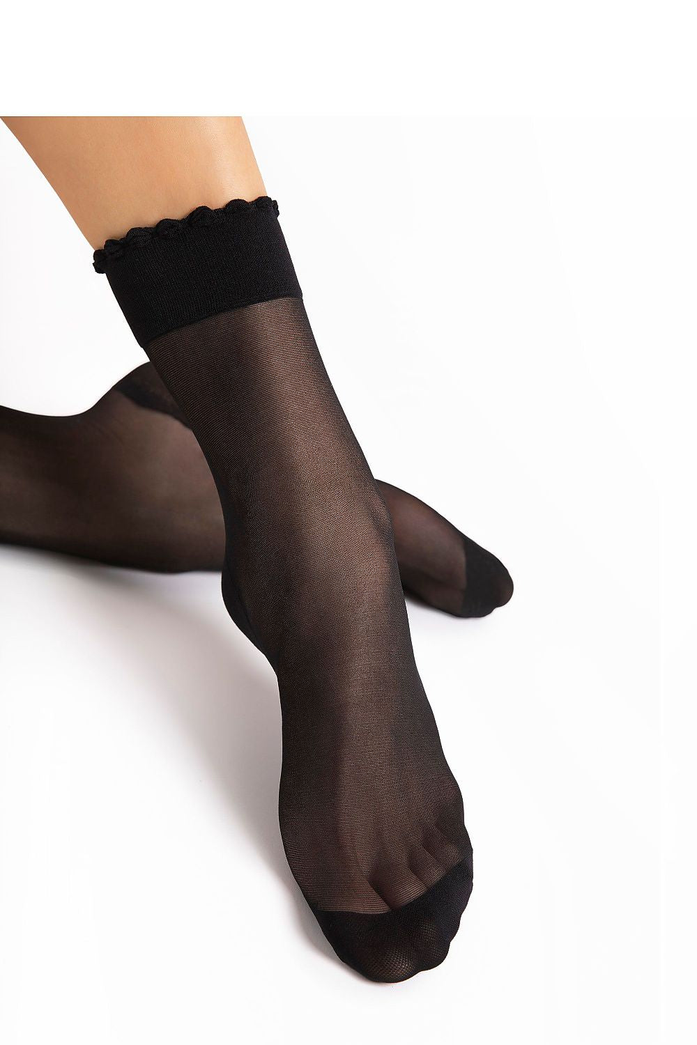 Elegant Fiore High Socks 20 DEN featuring smooth, high-quality fabric, perfect for both casual and formal styles with reinforced toe and sole for durability.