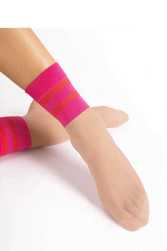Luxurious Fiore Elegant 20 DEN High Socks for Women showcasing transparent fabric and non-binding cuff, ideal for sophisticated styling and everyday comfort.