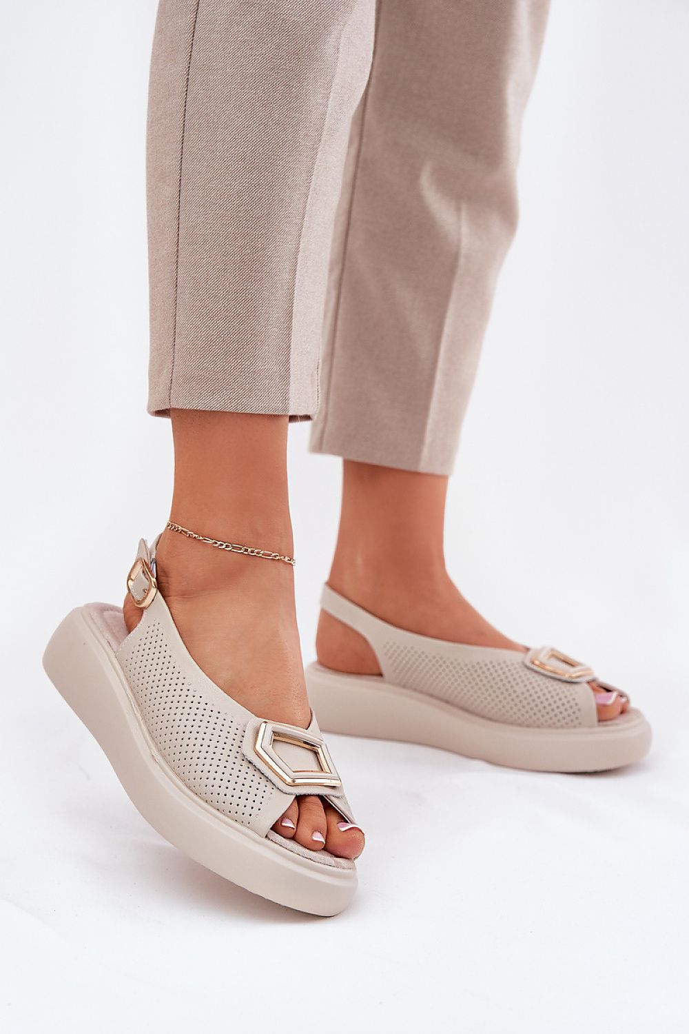 Luxury natural leather women's sandals by Step in style, featuring an elegant design with adjustable buckle for a perfect fit, ideal for summer occasions.