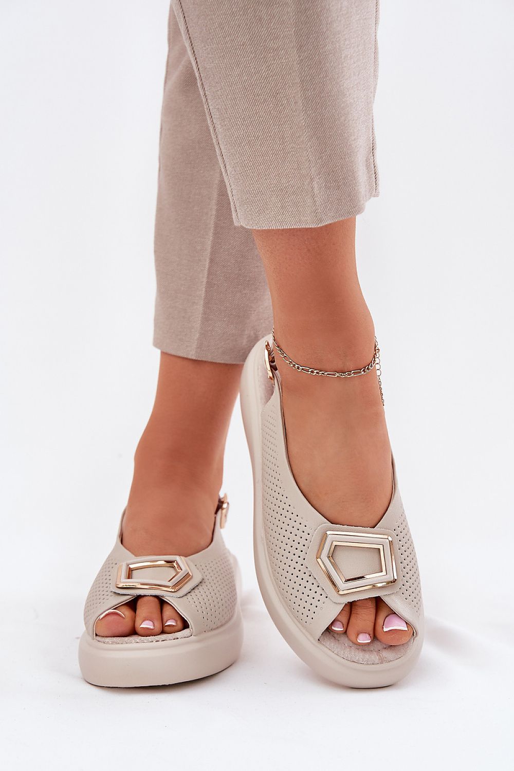 Elegant women's sandals by Step in style with classy front decoration, adjustable straps, and a natural leather finish, perfect for chic summer styling.