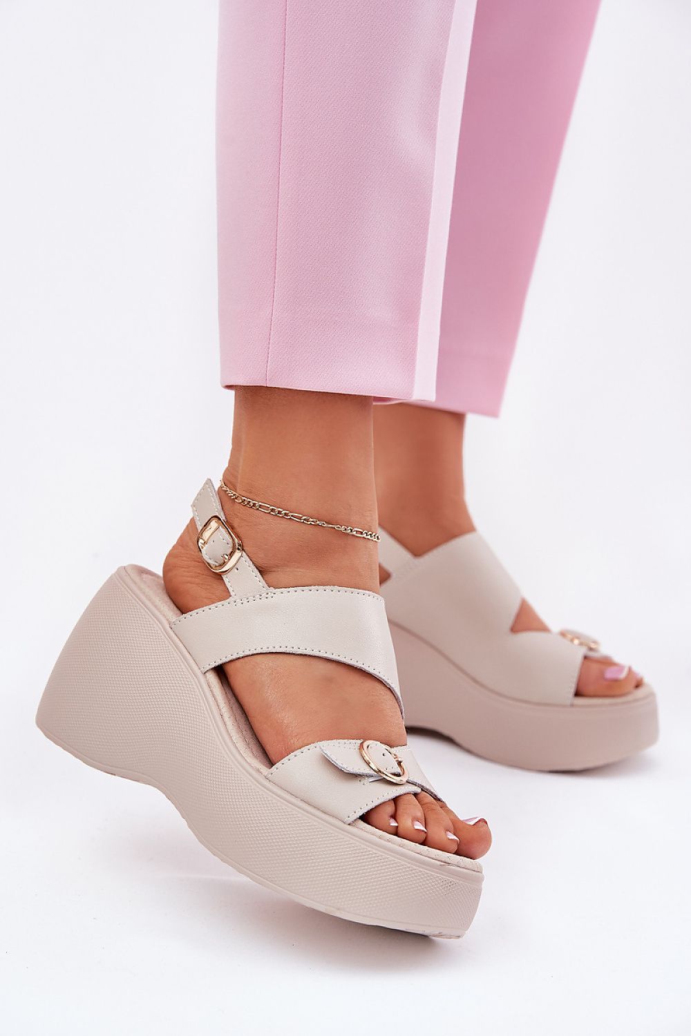Close-up view of Step in style's women's leather sandals showcasing the soft leather insole and detailed buckle strap design.