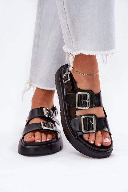 Lifestyle image of women's suede sandals from Step in Style, perfectly complementing a chic summer outfit with their elegant and functional design.