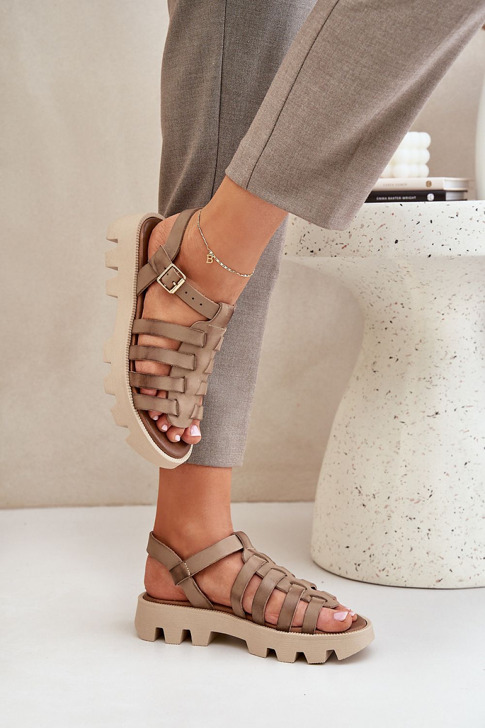 Elegant luxury women's sandals in natural leather with a chic adjustable strap and stylish platform, designed by Step in Style.