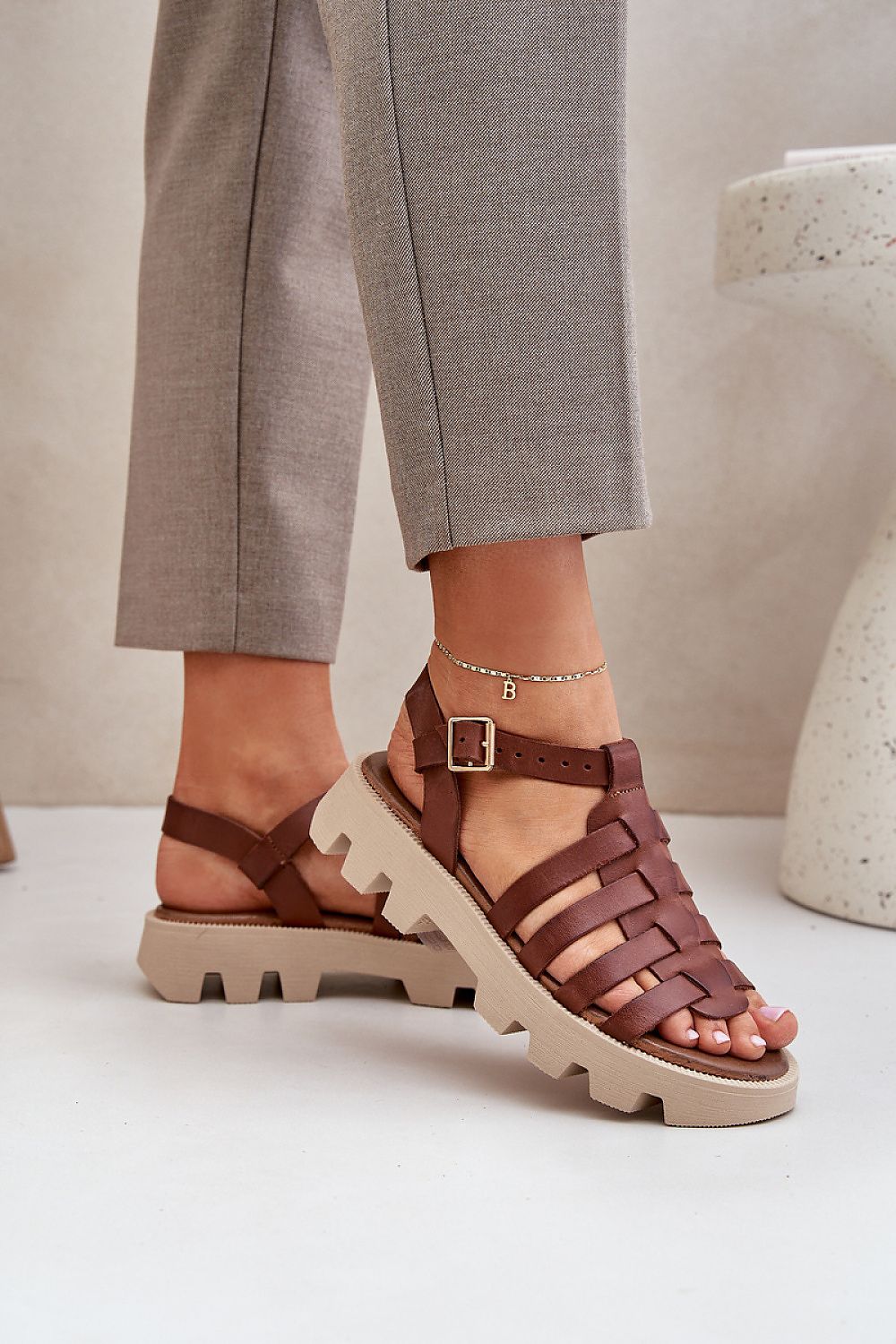 Step in Style women's luxury sandals made from natural leather, showcasing a stylish adjustable strap and platform height, epitomising summer chic.