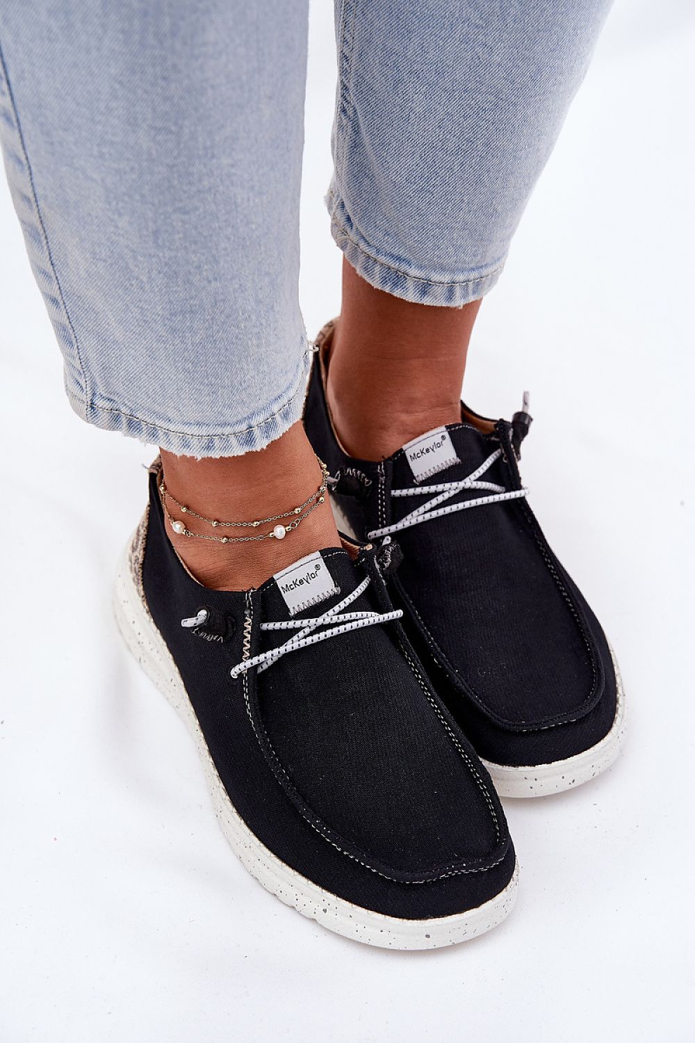 Elegant women's slip-on shoes by Step in Style, crafted from soft textile material, showcasing a luxurious design with an easy slip-on style and comfortable cushioned insole.