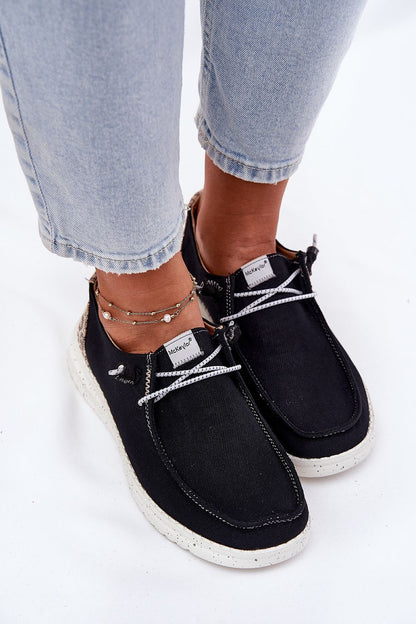 Elegant women's slip-on shoes by Step in Style, crafted from soft textile material, showcasing a luxurious design with an easy slip-on style and comfortable cushioned insole.