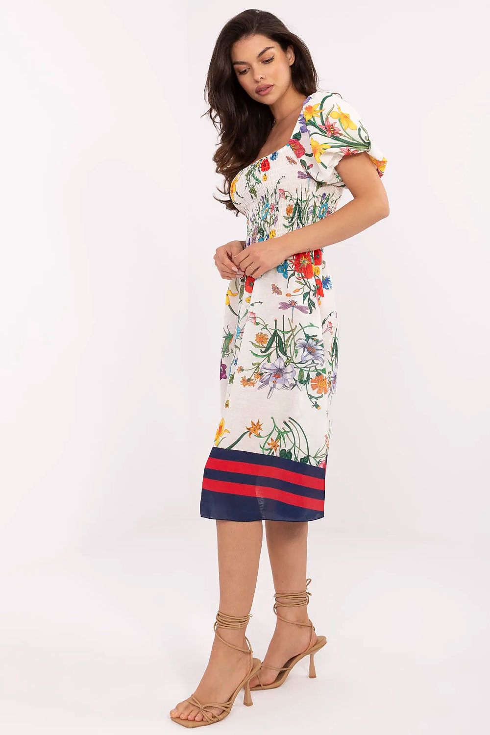 Elegant summer dress by Italy Moda featuring a flared cut and floral design, perfect for warm weather style.