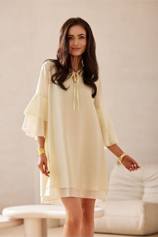 Chic knee-length Roco Fashion cocktail dress in lightweight Lyocell featuring a V-neck and 3/4 sleeves, perfect for elegant occasions.