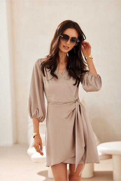 Close-up of the Frederica Satin Day Dress by Roco Fashion, highlighting the delicate fabric and romantic tie waist, ideal for enhancing femininity.