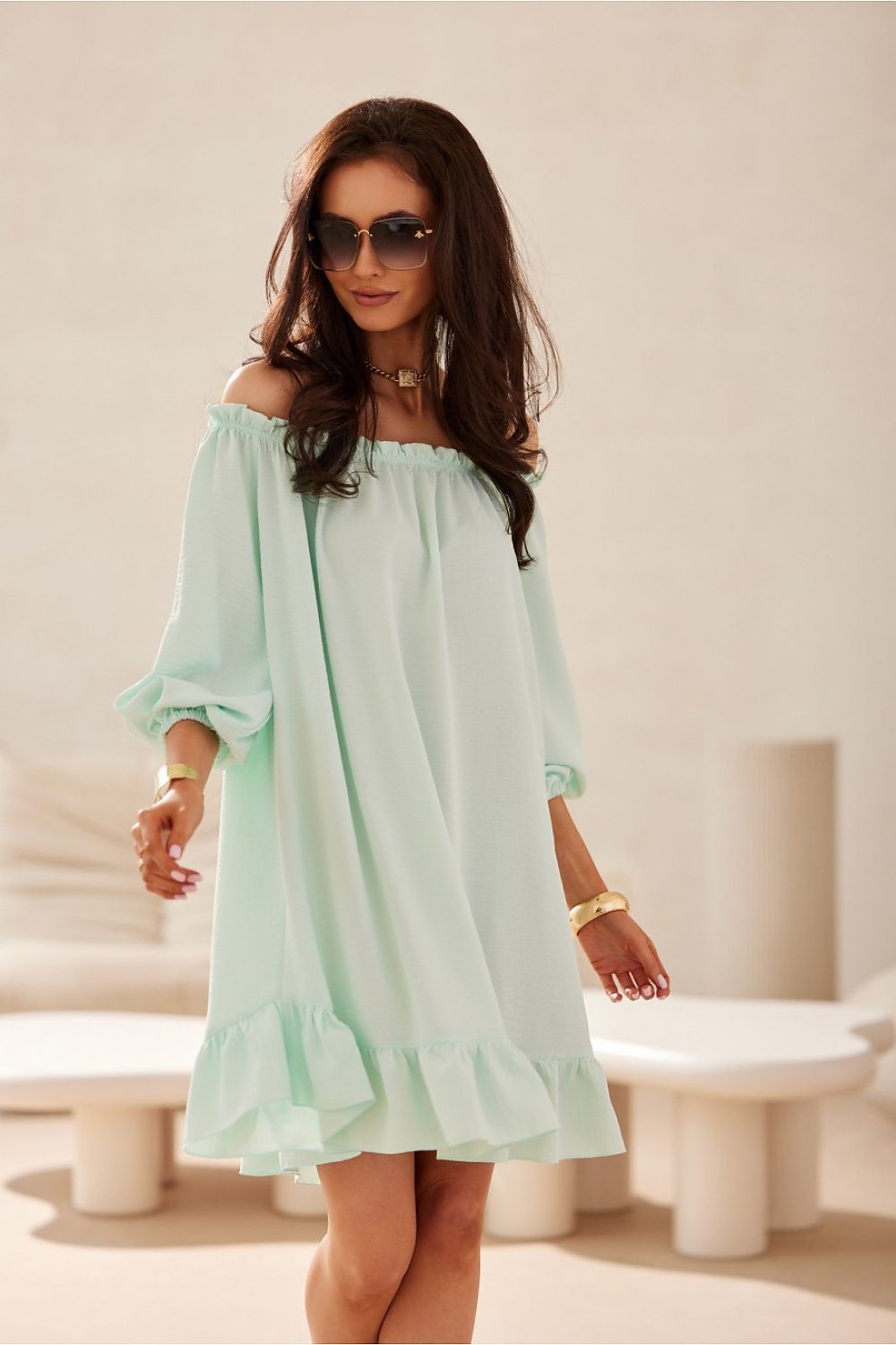 Roco Fashion's Giulia Dress featuring ruffles and a lightweight design, embodying feminine charm for a luxurious summer look.