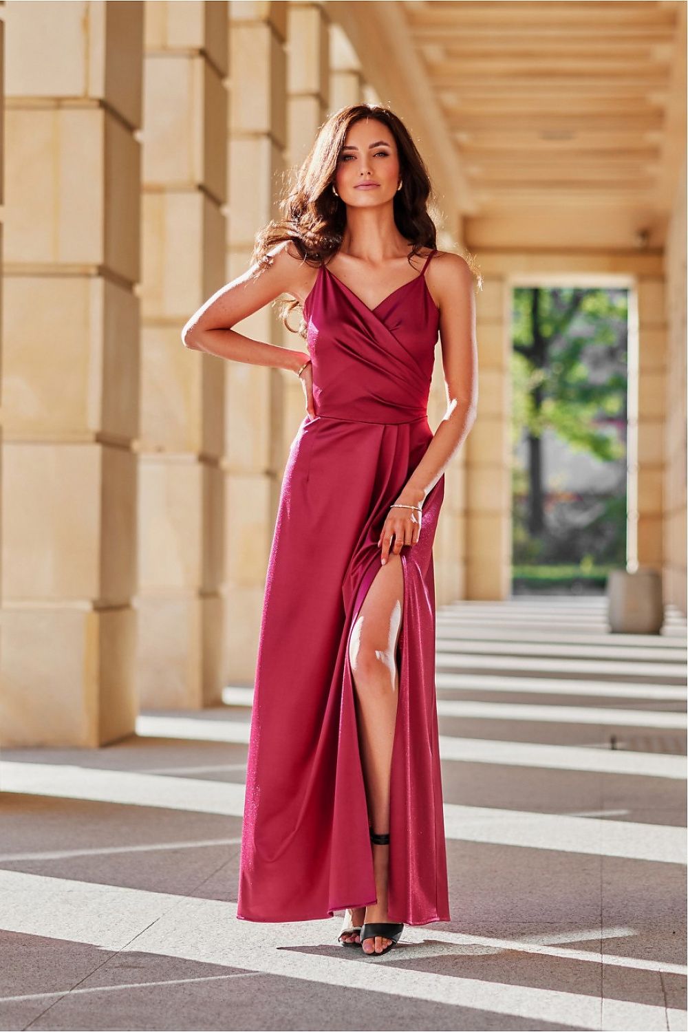Model wearing the Elegant Satin Long Salma Dress with a slit, epitomising luxury and femininity, designed by Roco Fashion.