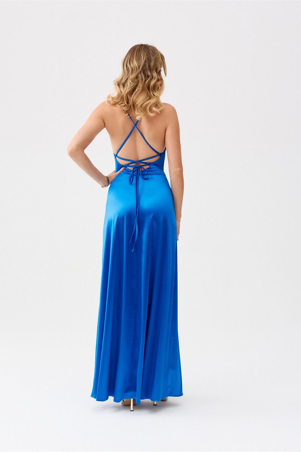 Alessandra Maxi Dress by Roco Fashion, featuring an elegant satin fabric with a wrap neckline, showcasing a luxurious silhouette suitable for upscale occasions.