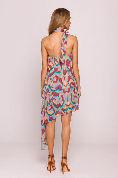 Elegant sleeveless Moe Daydress showcasing a unique halter neck design and open back, ideal for warm weather elegance.