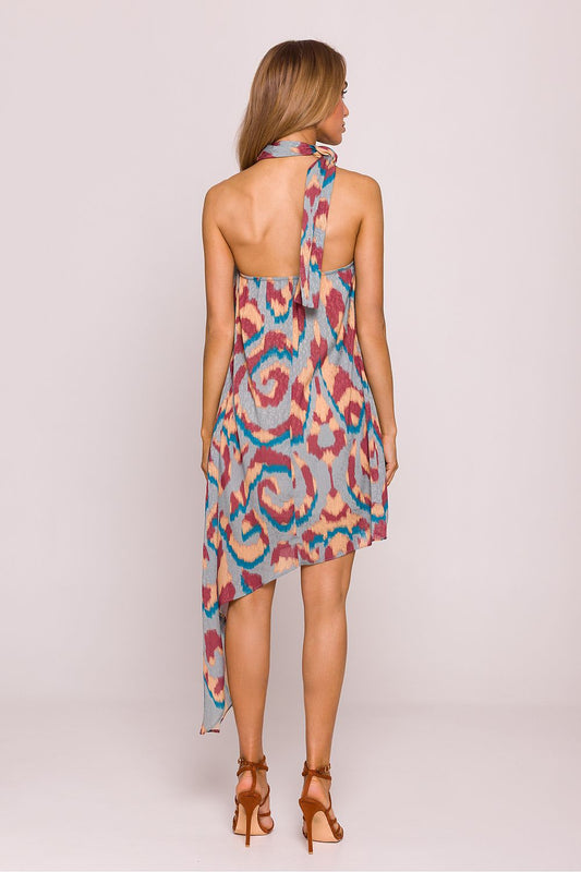 Elegant sleeveless Moe Daydress showcasing a unique halter neck design and open back, ideal for warm weather elegance.