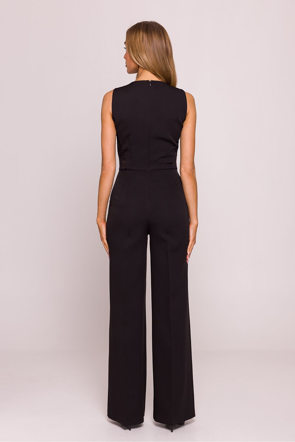 Elegant Geometric Lace Jumpsuit by Moe, featuring a fitted sleeveless design with intricate lace panels and wide, long legs for a sophisticated silhouette.