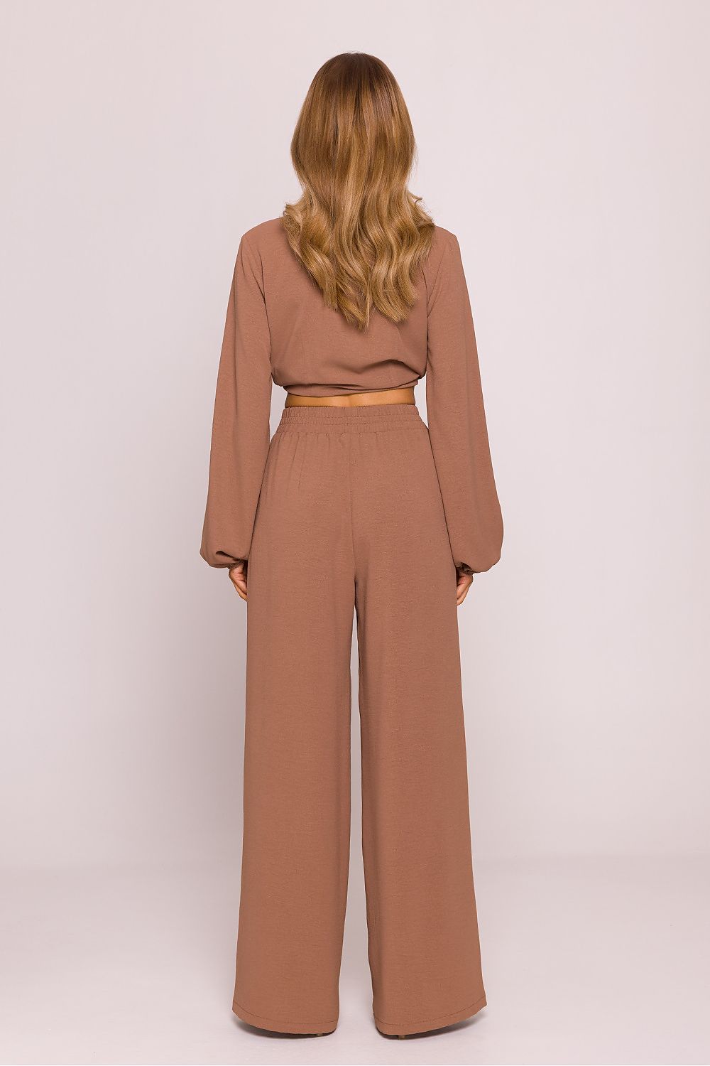 Moe Women's Lightweight Crepe Trousers styled for an elegant look, featuring wide long legs ideal for comfortable and chic wear.