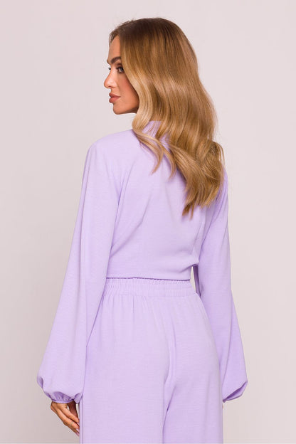 Moe's Lightweight Crop Blouse with puffy sleeves, perfect for pairing with high-waisted pants.