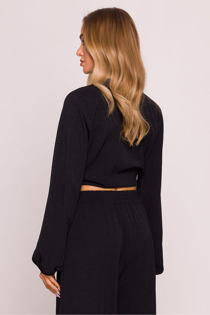 Back view of Moe's Luxury Crepe Crop Blouse, emphasizing the cropped length and puff sleeve silhouette for a romantic look.