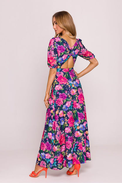 Stunning Moe daydress with exquisite floral pattern and sensual cutout back, tailored to offer comfort and style.