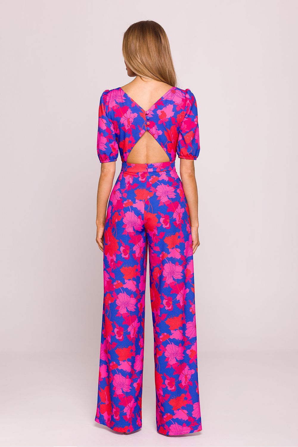 Elegant floral print jumpsuit with a fitted top and wide trousers by Moe, showcasing a romantic silhouette perfect for special occasions.
