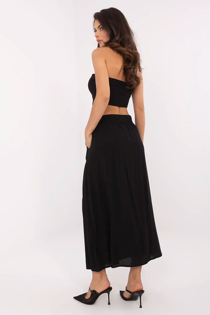 Elegant Eco-Friendly Midi Skirt by Fresh Made, crafted from breathable viscose with stylish slip pockets and button closure, perfect for versatile everyday wear.