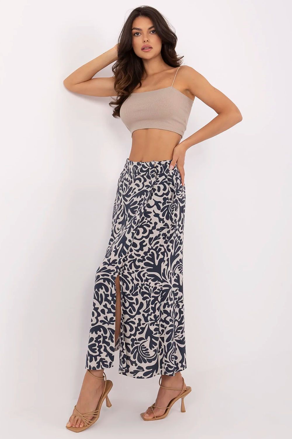 Elegant midi skirt with practical pockets, made from eco-friendly viscose, offered by Fresh Made in sizes XS to XL.