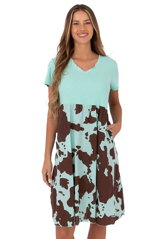 Elegant knee-length flared dress with sweetheart neckline and pockets, crafted from a luxurious cotton blend by Italy Moda, perfect for summer outings.