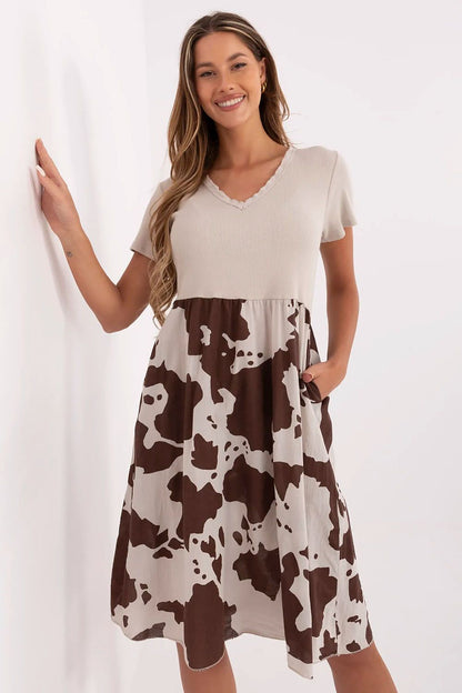 Elegant knee-length flared dress with sweetheart neckline by Italy Moda, showcasing a breathable cotton blend and chic animal motif for a stylish summer look.