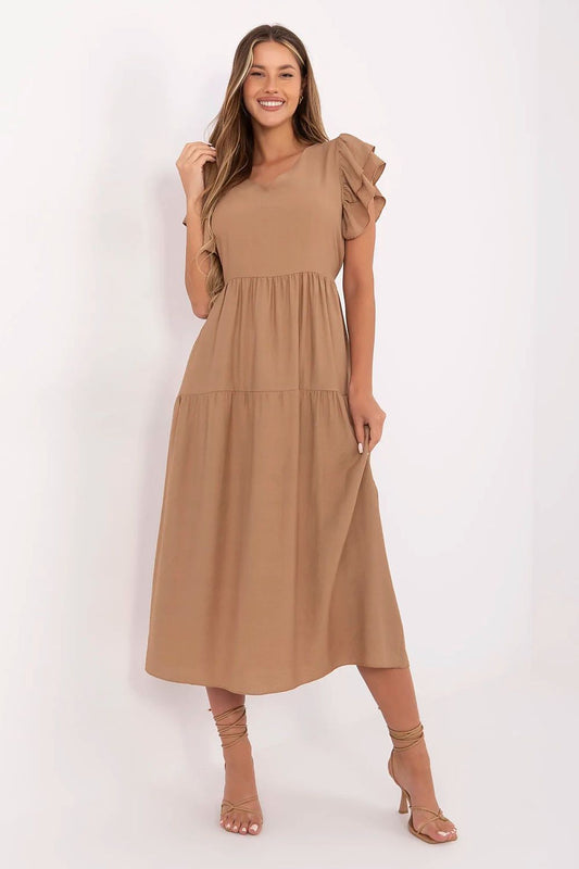 Elegant midi daydress by Italy Moda, crafted from a lightweight blend of viscose and nylon, featuring a flattering flared cut, romantic short ruffle sleeves, and a stylish V-neck, designed for luxurious comfort and sophisticated summer style.