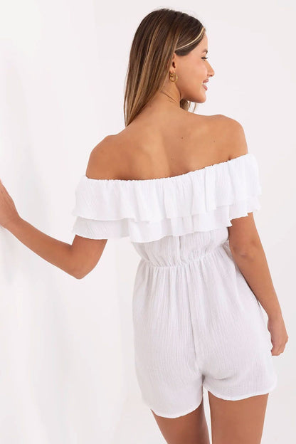 Light and airy muslin jumpsuit from Italy Moda, featuring a flattering silhouette and 100% cotton material for utmost comfort.