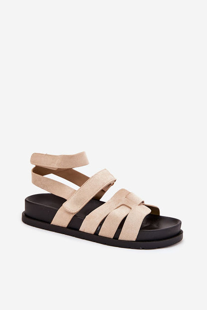 Chic women's sandals by Step in Style, crafted from eco suede with a unique leg-wrapping strap, ideal for fashionable summer looks.