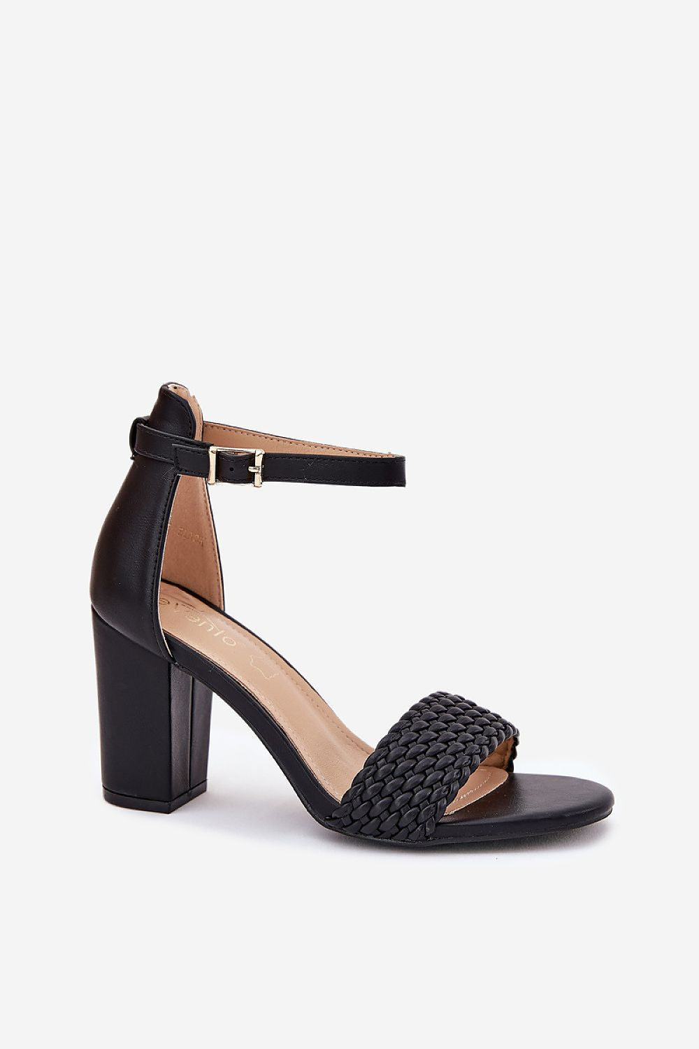 Close-up of Step in Style eco-leather women's heel sandals with intricate braided strap design and natural leather footbed for luxurious comfort.