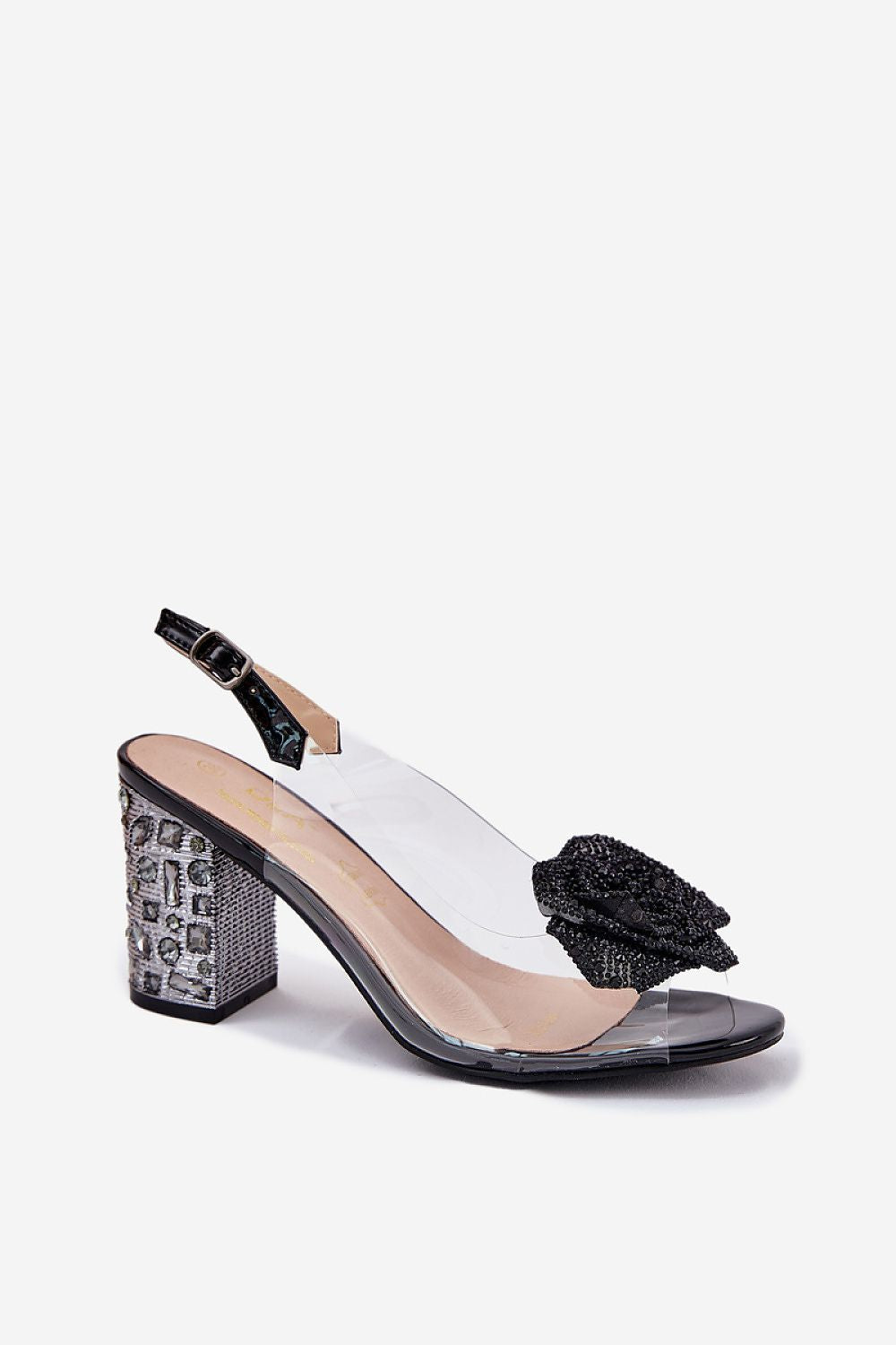 Stylish display of women's transparent sandals with a glamorous crystal heel by Step in Style, ideal for evening events and celebrations, available in EU sizes 36-41.