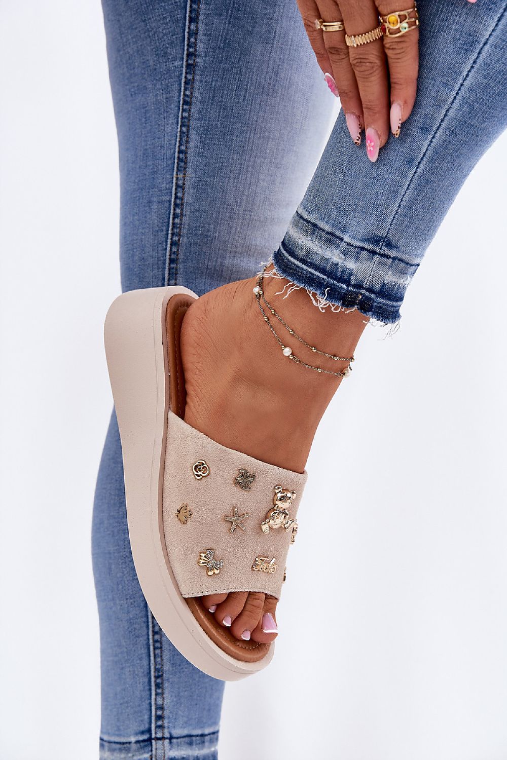 Chic Vinceza women's suede sandals with unique buckle accents, providing both fashion and comfort for warm weather outings.