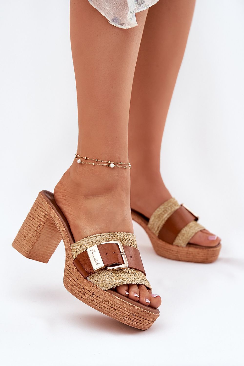 Stylish women's leather sandals with buckle design, showcasing a comfortable fit by Step in style, ideal for both casual and formal occasions.