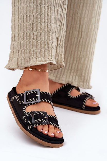 Stylish women's suede sandals from Step in Style, adorned with decorative stitching and buckle detail, ideal for urban and holiday outfits.