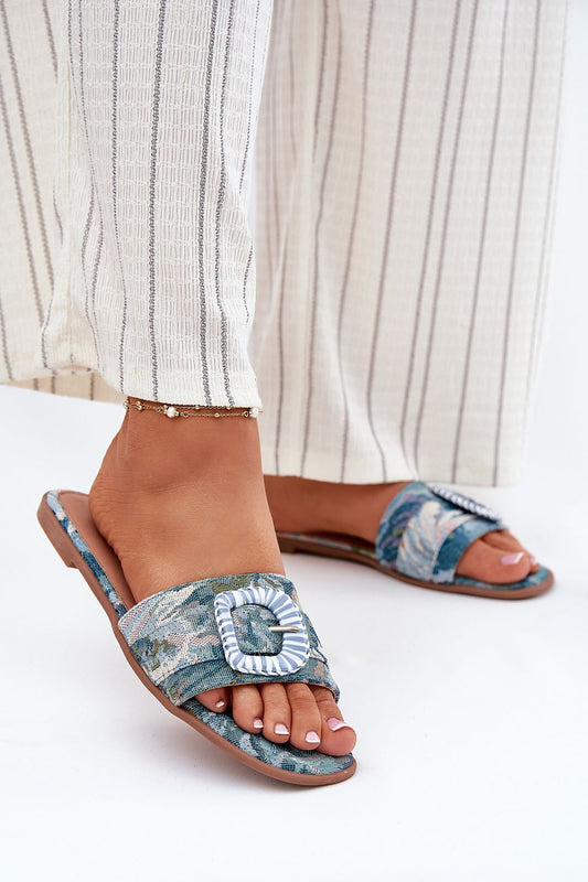 Elegant women's flat-heeled sandals with decorative buckle, crafted by Step in Style, perfect for summer fashion.
