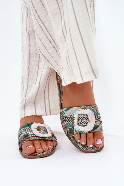 Chic women's flat-heeled sandals with a fashionable buckle, elegantly made by Step in Style for summer outings.