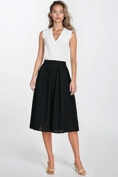Chic Nife linen texture midi skirt with decorative pleats and hidden side pockets, perfect for both casual and formal occasions.
