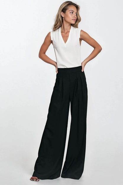 Elegant high-waisted women's trousers with palazzo legs by Nife, showcasing a linen-rayon blend fabric.