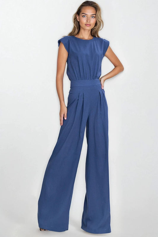 Sophisticated view of Nife's linen-blend jumpsuit showcasing its breathable fabric, fitted waist, and elegant silhouette.