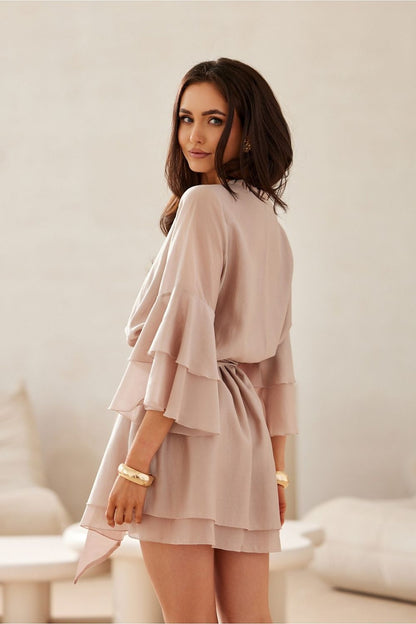 Elegant Beatrice Boho Cocktail Dress by Roco Fashion, showcasing a lightweight Lyocell fabric with a feminine trapeze shape, knee-length design, low stand-up collar, delicate lacing, and romantic 3/4 sleeves, perfect for versatile styling.