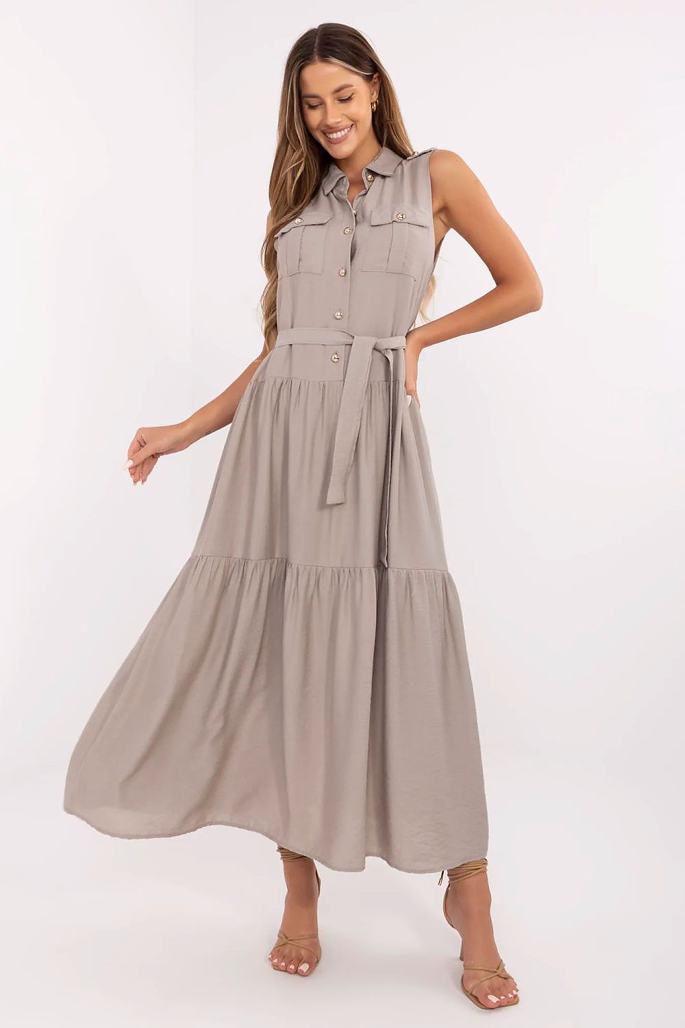 Elegant Maxi Daydress by Italy Moda featuring a flared sleeveless design and stylish waist tie, perfect for sophisticated casual outings.