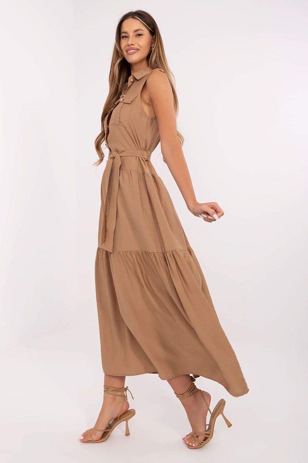 Gorgeous flap pockets and wide ruffle detailing at the bottom of Italy Moda's Maxi Daydress, combining utility with elegance in design.