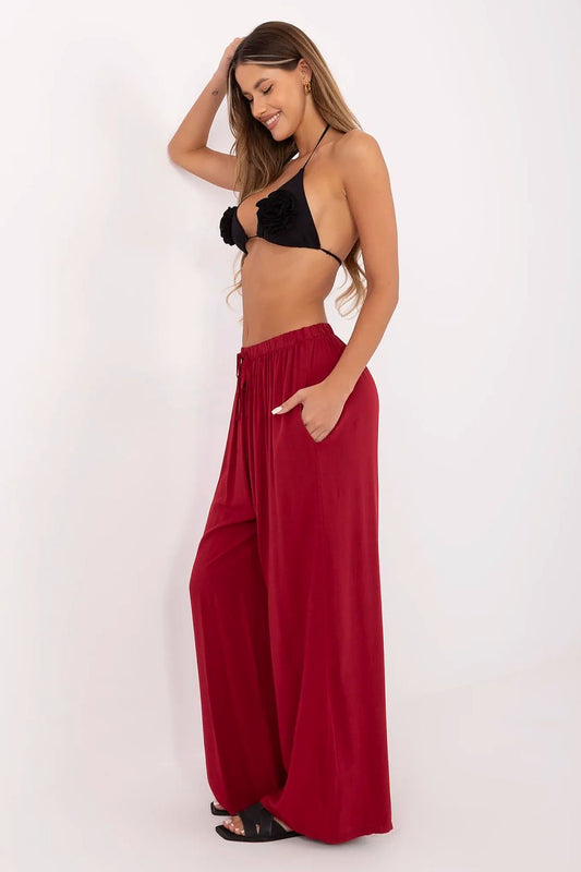 Close-up view of Italy Moda Women's High-Waisted Palazzo Trousers featuring a stylish tie waist, exuding sophistication and comfort for everyday elegance.